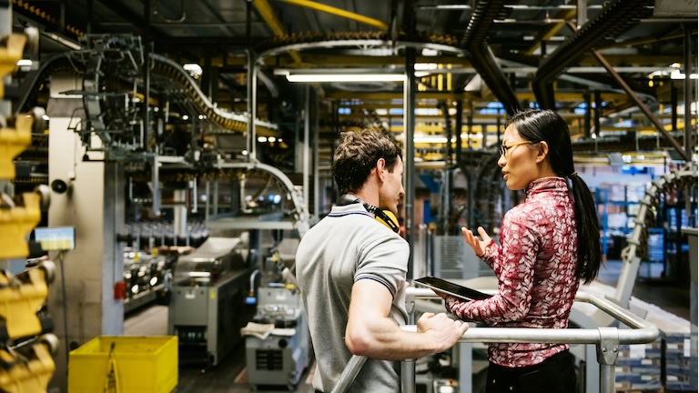 Manufactering workers talking