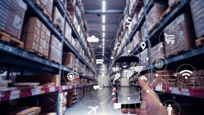 mobile phone being used to locate inventory in large warehouse on shelves